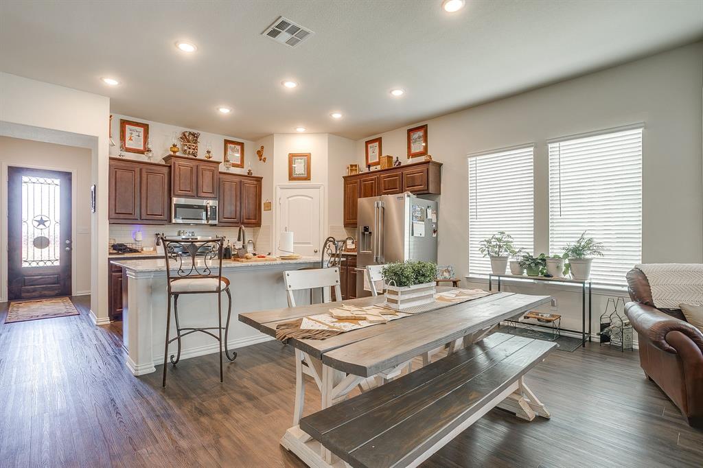1328 San Marcus Drive Springtown, TX 76082 - Photo 13 of 37 a living room with stainless steel appliances furniture and a wooden floor