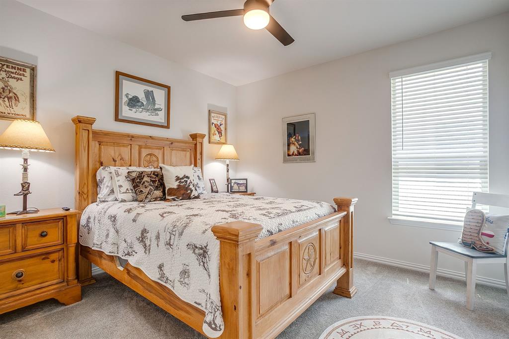 1328 San Marcus Drive Springtown, TX 76082 - Photo 25 of 37 a bed room with a bed and a window