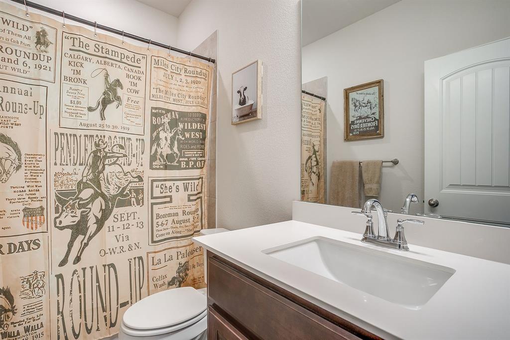 1328 San Marcus Drive Springtown, TX 76082 - Photo 30 of 37 Bathroom with vanity and a shower with curtain
