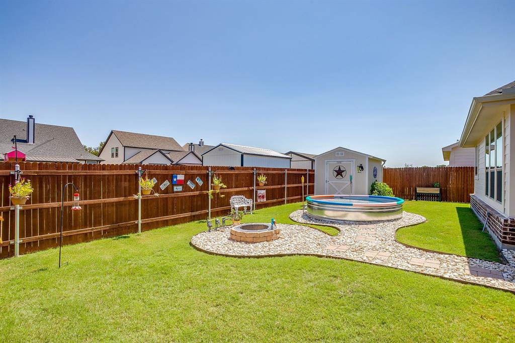 1328 San Marcus Drive Springtown, TX 76082 - Photo 34 of 37 a view of a house with swimming pool and a yard