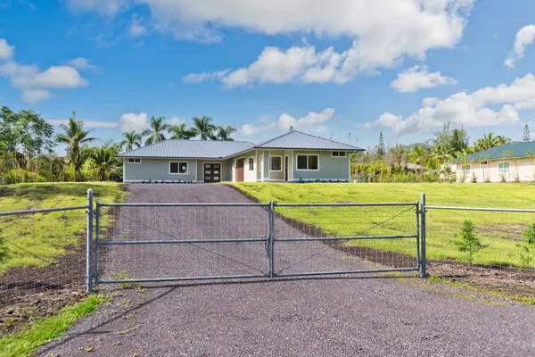 a view of a house with a big yard