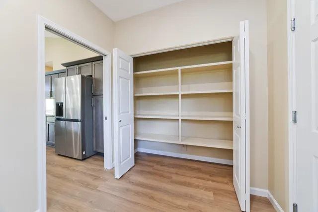 a view of utility room with closet