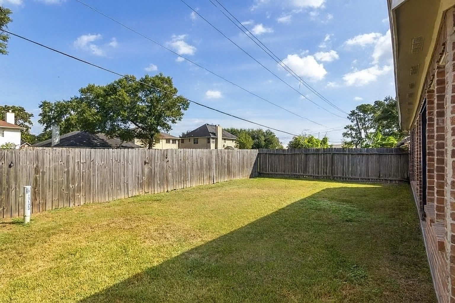 13123 Labelle Lane Houston, TX 77015 - Photo 23 of 23 a swimming pool with wooden fence