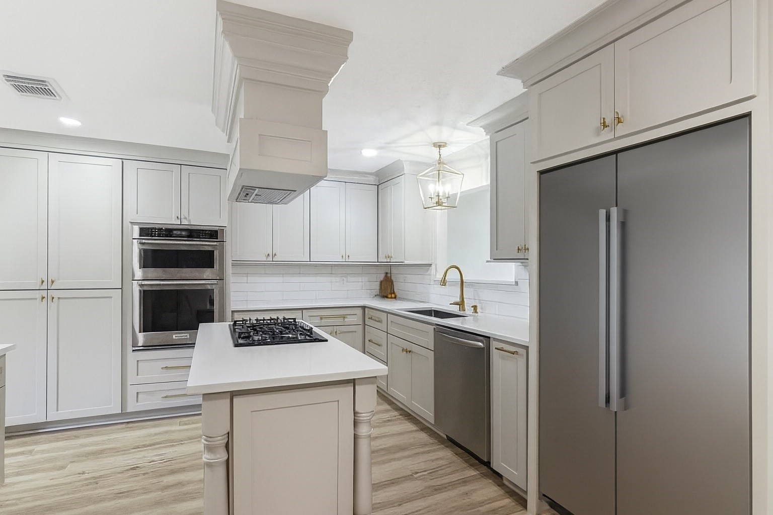 13123 Labelle Lane Houston, TX 77015 - Photo 10 of 23 a kitchen with stainless steel appliances a refrigerator sink and cabinets