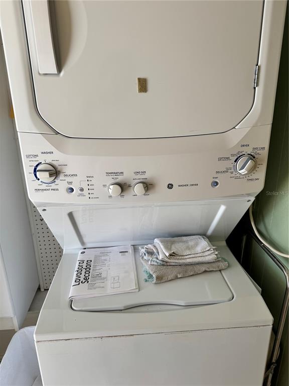 1891 Englewood Road, Unit 45 Englewood, FL 34223 - Photo 34 of 55 a utility room with washer and dryer