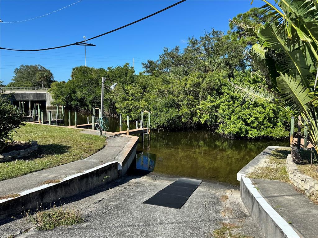 1891 Englewood Road, Unit 45 Englewood, FL 34223 - Photo 36 of 55 a view of a house with pool
