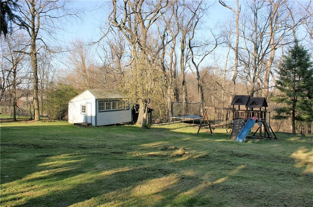 2318 Middle Road Glenshaw, PA 15116 - Photo 3 of 15 A large level back yard like this is hard to find. The shed is large enough for storage.