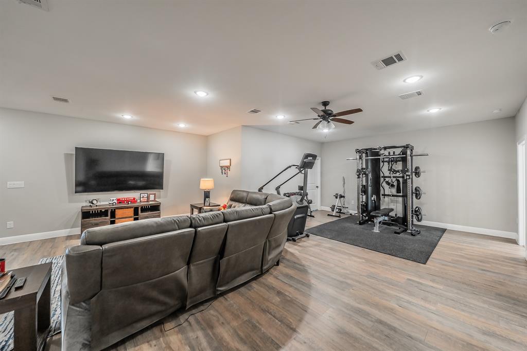 117 Rock Salt Drive Springtown, TX 76082 - Photo 16 of 38 Spacious room featuring wood-finish flooring, recessed lighting, and a ceiling fan