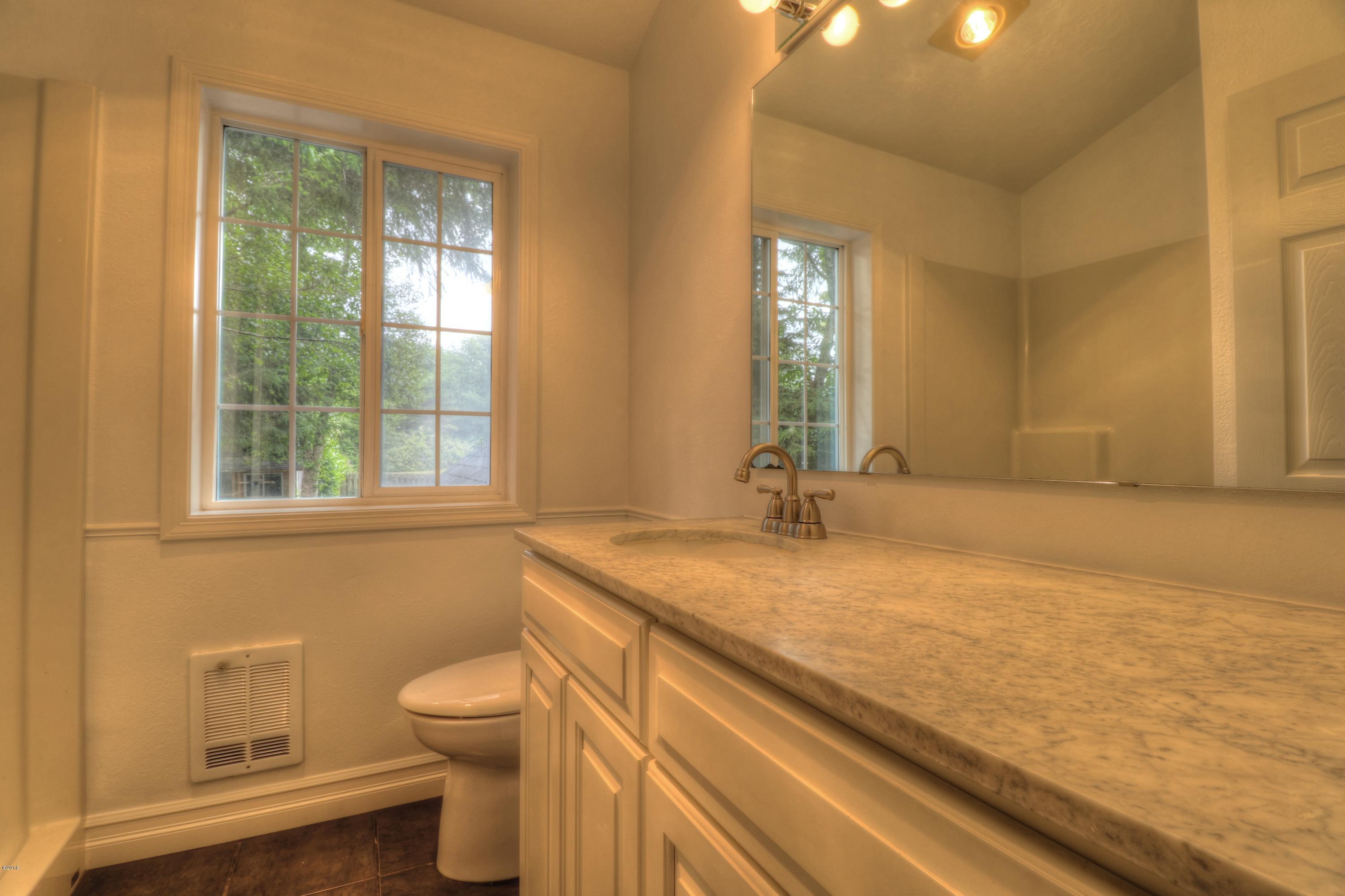 9775 Southeast Cedar Street South Beach, OR 97366 - Photo 31 of 33 Bedroom 3 On-Suite Bath
