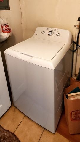 a view of a backyard of the house