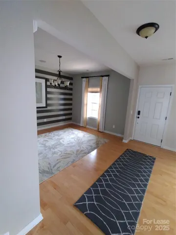 a view of an empty room and window