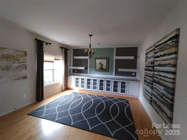 a view of a livingroom with furniture and window