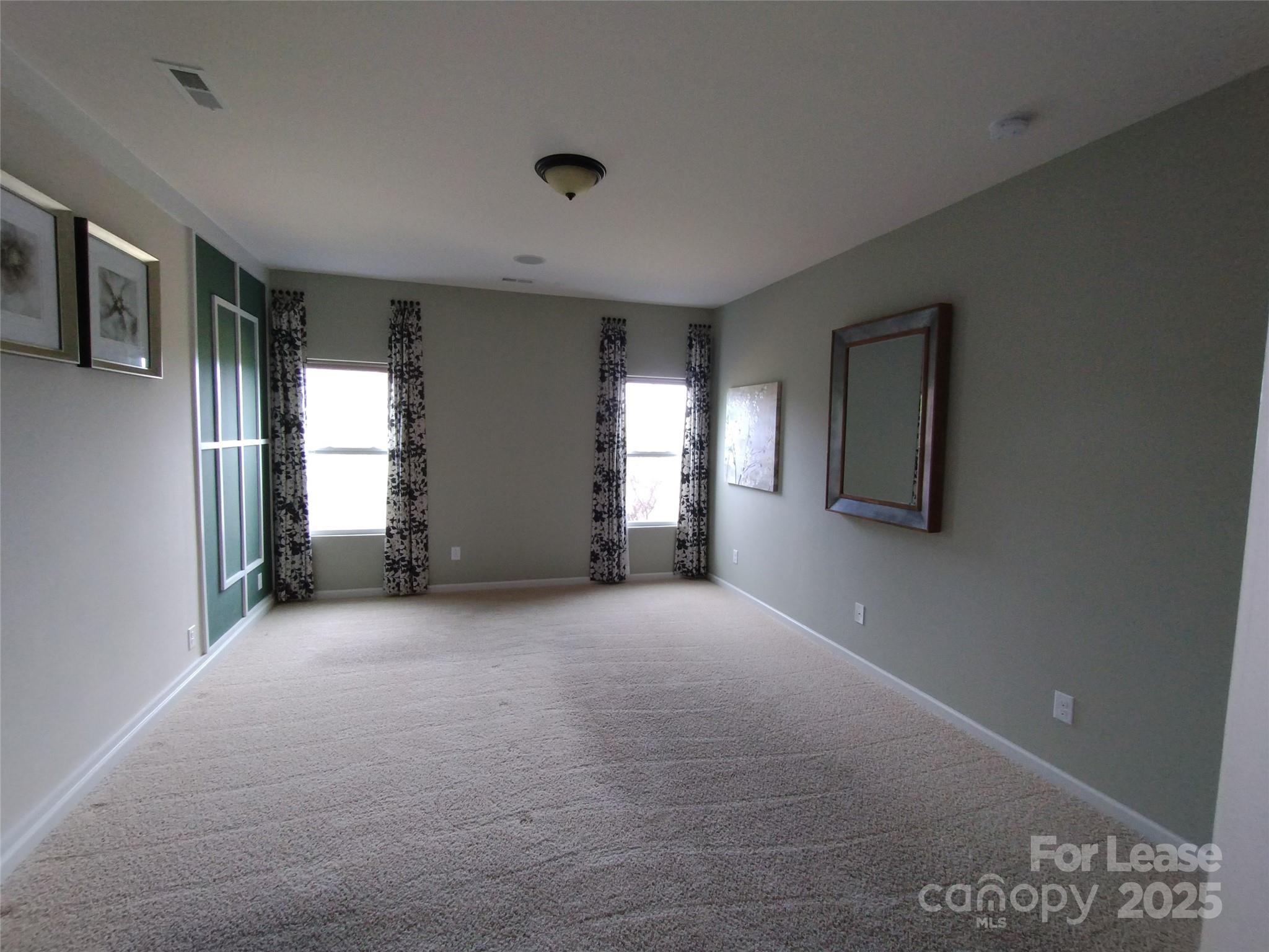 105 East Neel Ranch Road Mooresville, NC 28115 - Photo 19 of 23 a view of empty room with windows