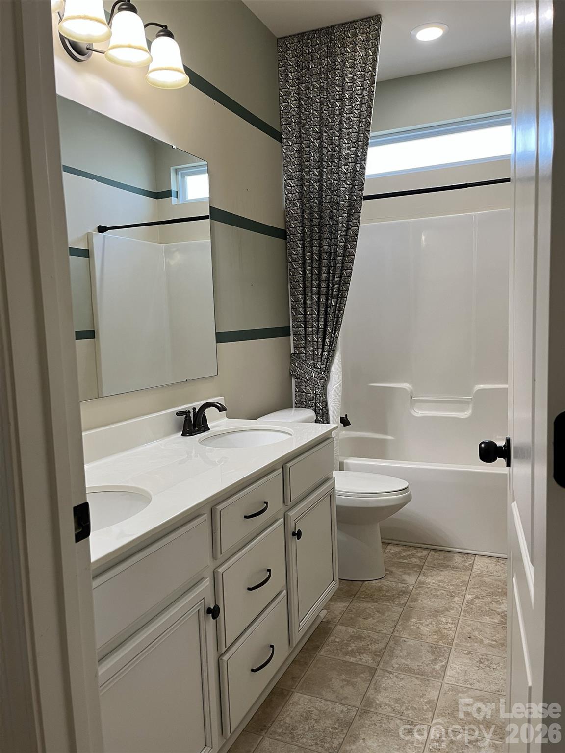 105 East Neel Ranch Road Mooresville, NC 28115 - Photo 19 of 27 a bathroom with a sink a toilet and shower