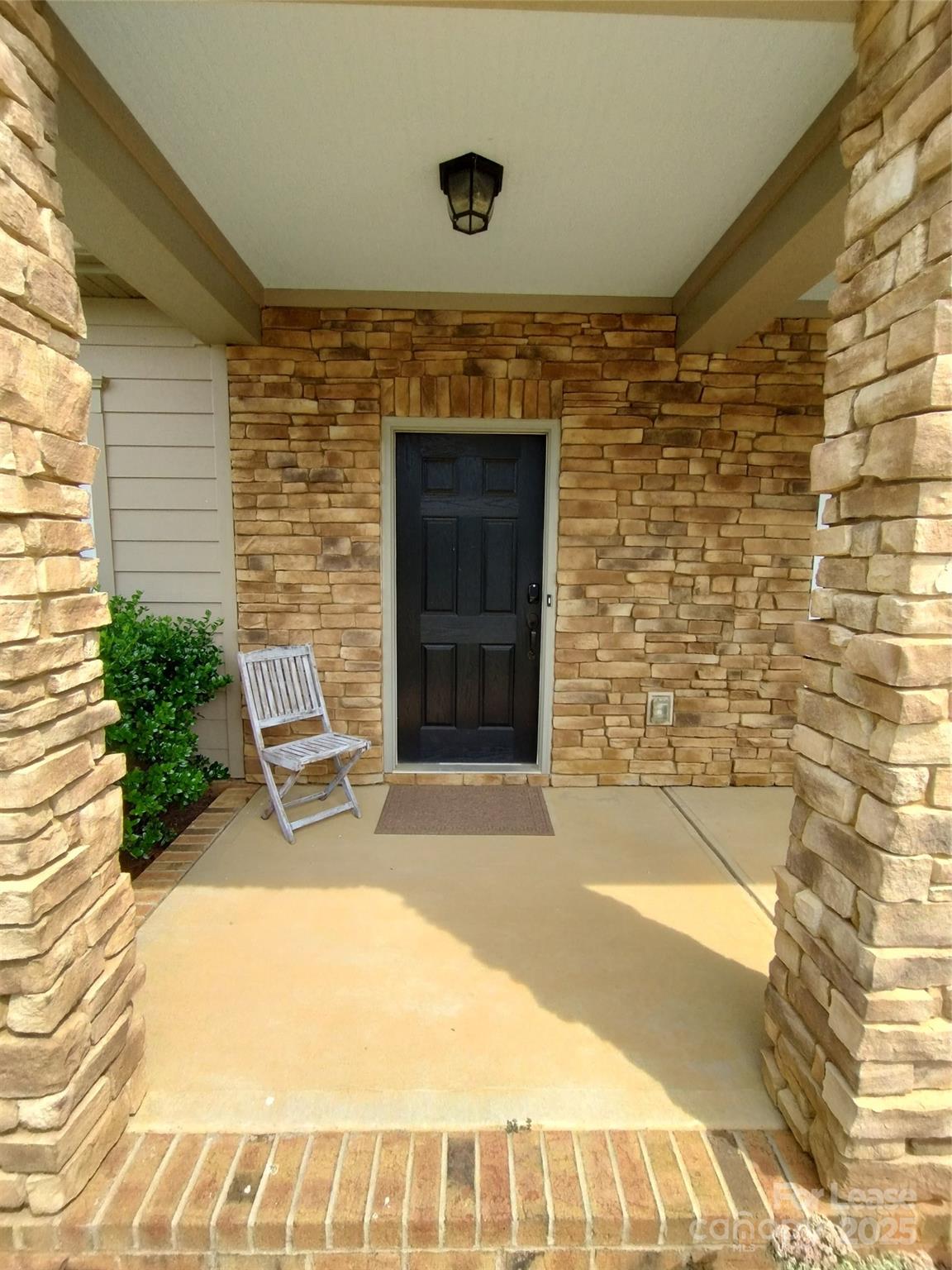 105 East Neel Ranch Road Mooresville, NC 28115 - Photo 2 of 23 a front view of a house with a yard