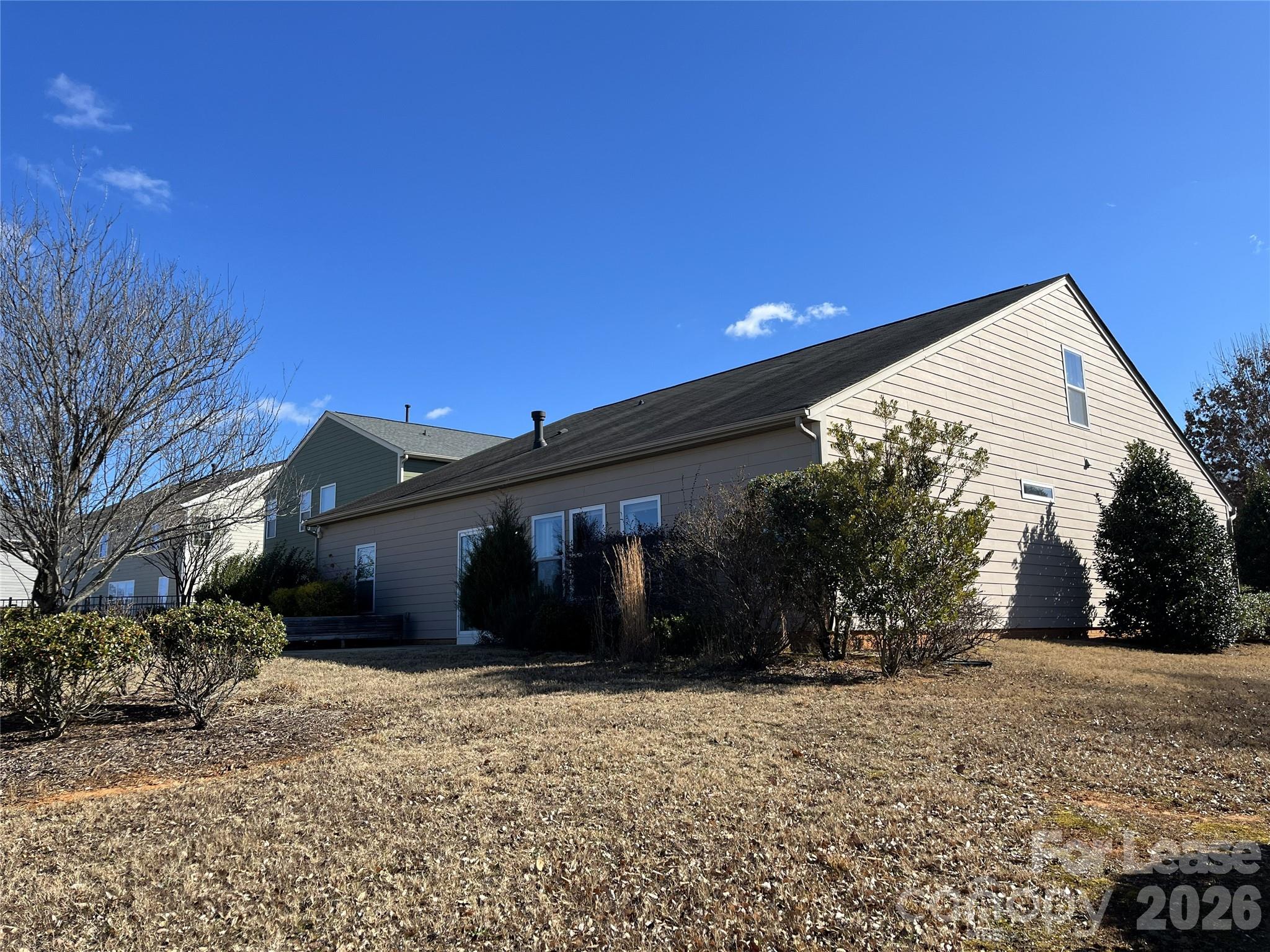 105 East Neel Ranch Road Mooresville, NC 28115 - Photo 25 of 27 a view of house with a yard