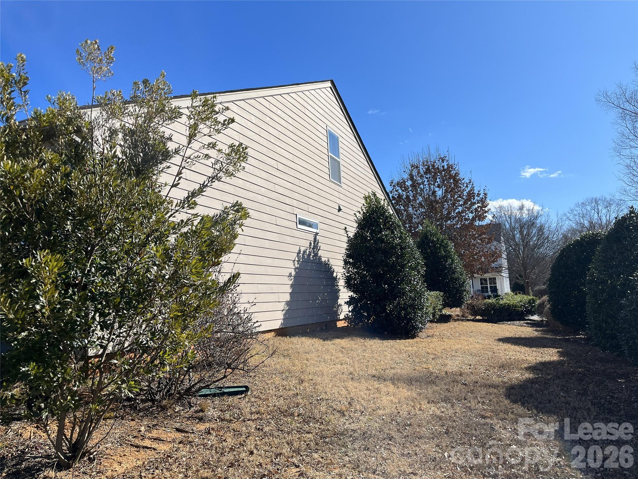 105 East Neel Ranch Road Mooresville, NC 28115 - Photo 26 of 27 a view of a yard with a tree