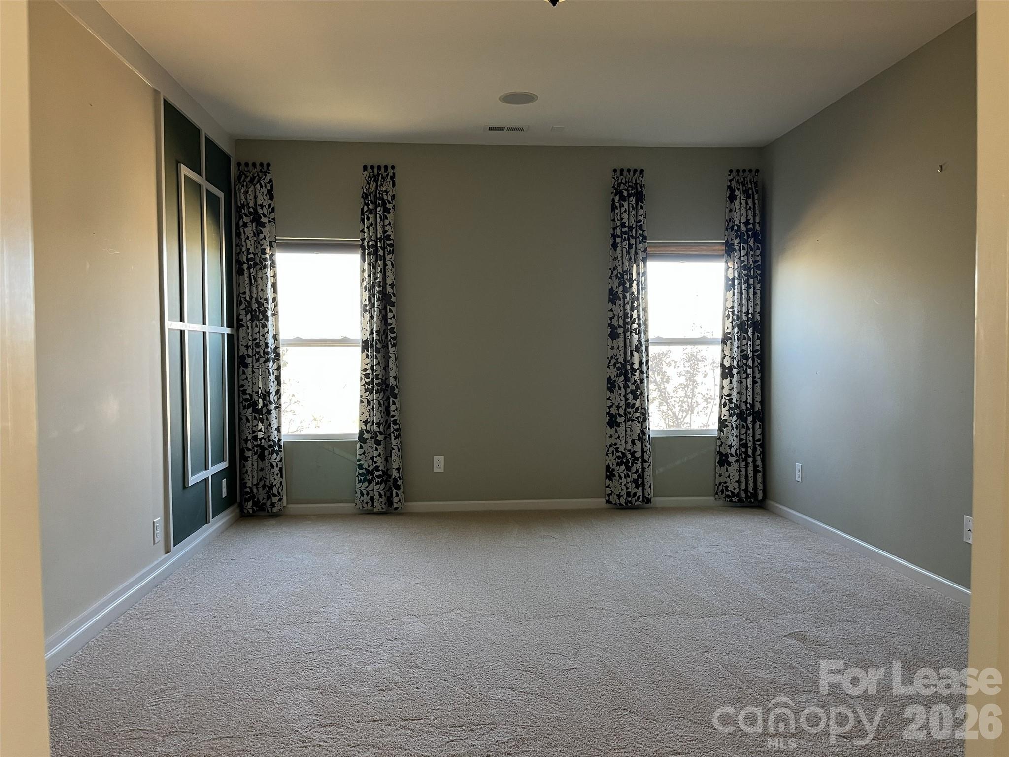 105 East Neel Ranch Road Mooresville, NC 28115 - Photo 10 of 27 an empty room with windows and closet