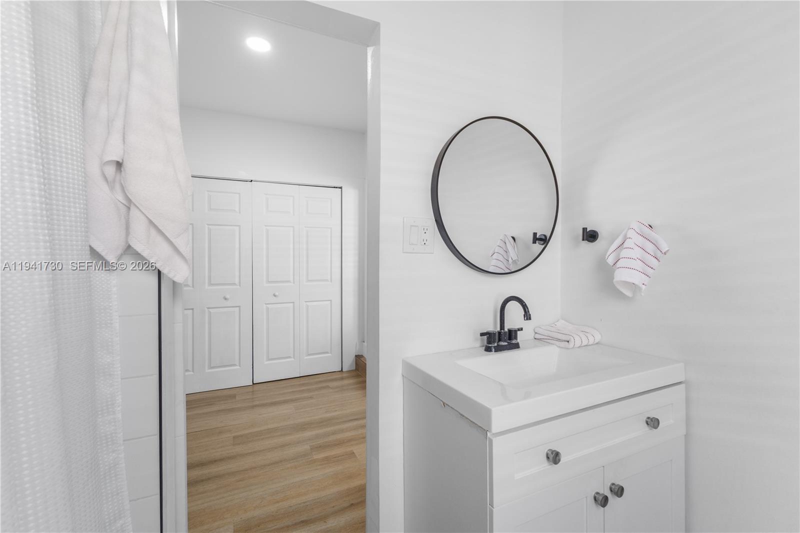 2811 Southwest 17th Street Miami, FL 33145 - Photo 21 of 36 a bathroom with a sink and a mirror