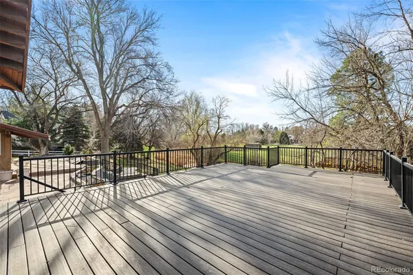 a view of backyard with wooden floor