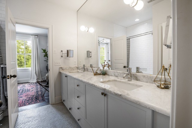 815 Sneed Road West Franklin, TN 37069 - Photo 13 of 32 a spacious bathroom with double sink and a mirror