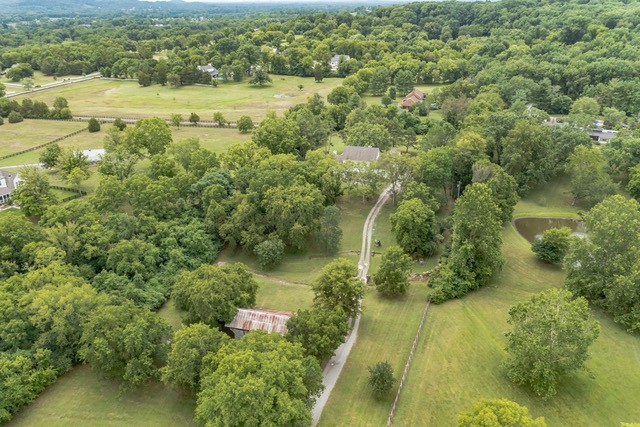 815 Sneed Road West Franklin, TN 37069 - Photo 32 of 32 a view of a lake with a yard