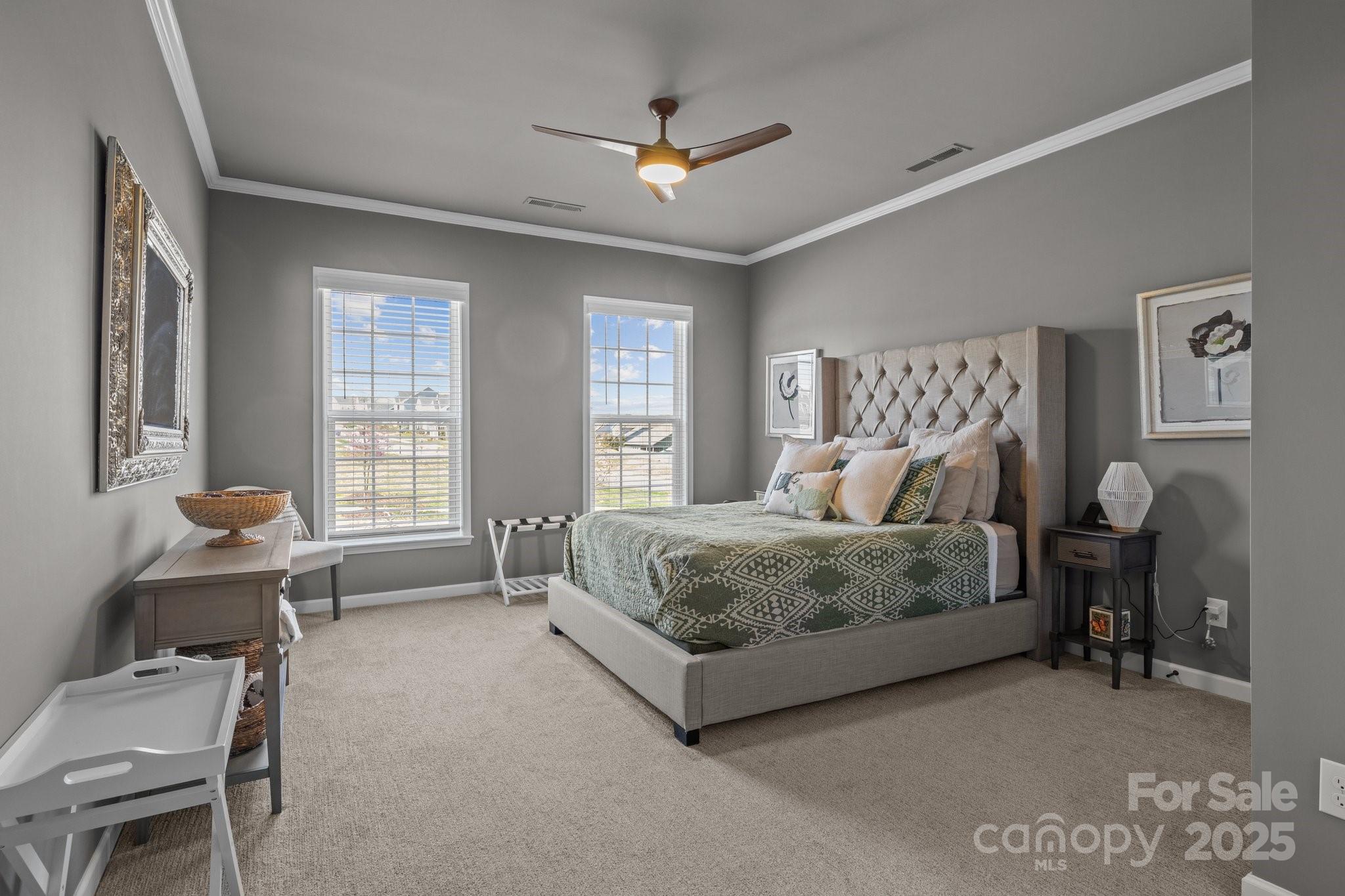 12709 Messenger Row Huntersville, NC 28078 - Photo 13 of 45 a bedroom with a bed and a couch