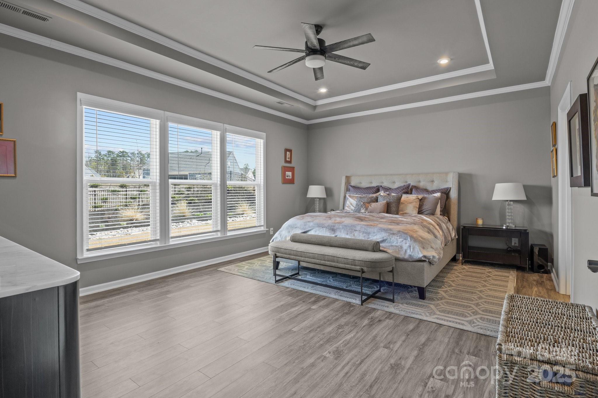 12709 Messenger Row Huntersville, NC 28078 - Photo 27 of 45 a bedroom with a large bed rug and window