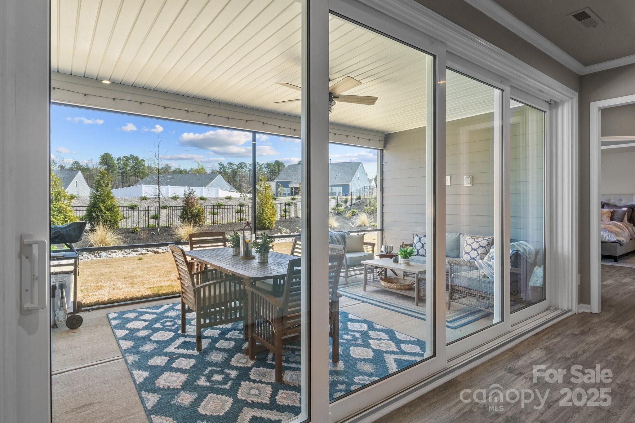 12709 Messenger Row Huntersville, NC 28078 - Photo 39 of 45 a room with patio outdoor dining table and chairs