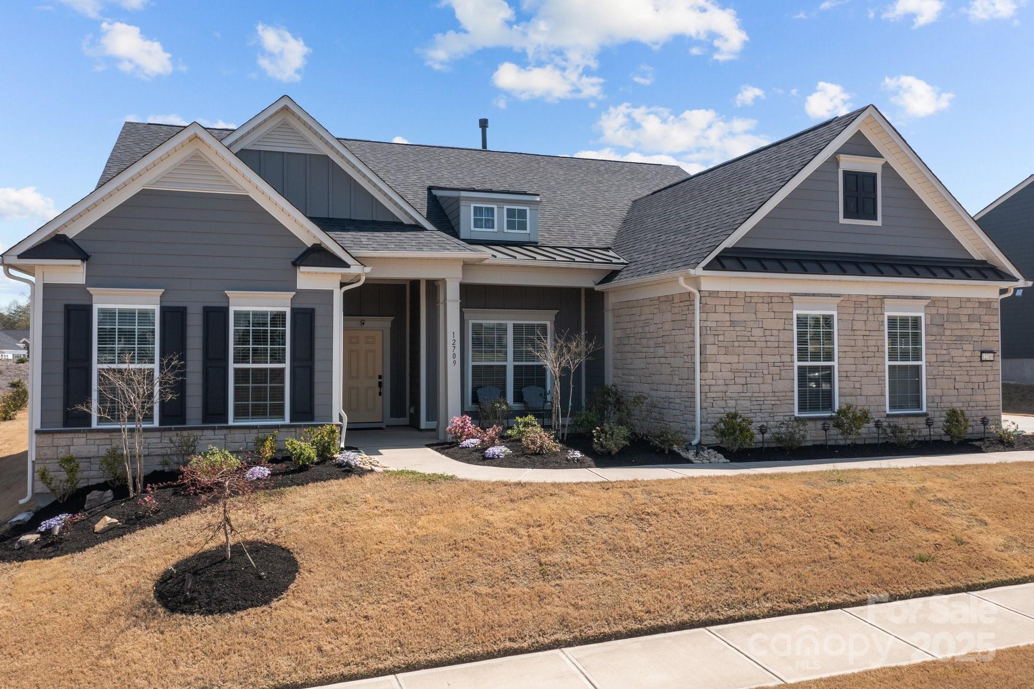 12709 Messenger Row Huntersville, NC 28078 - Photo 44 of 45 a front view of a house with a yard
