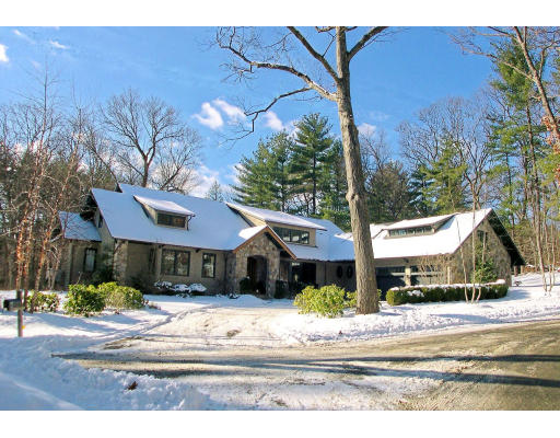 4 Robin Road Weston, MA 02493 - Photo 1 of 10 a view of a house with a yard and tree s