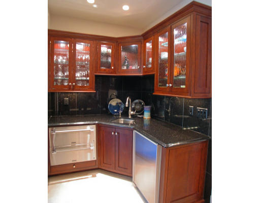 4 Robin Road Weston, MA 02493 - Photo 5 of 10 a kitchen with a sink and a stove
