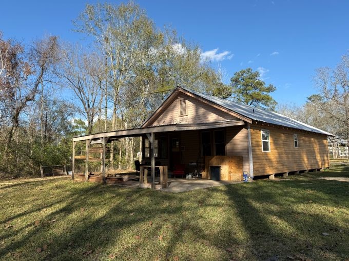 870 West Davis Loop Vidor, TX 77662 - Photo 14 of 14 a view of a house with a yard