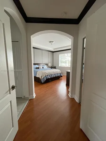 a en suite bathroom with a sink and a mirror