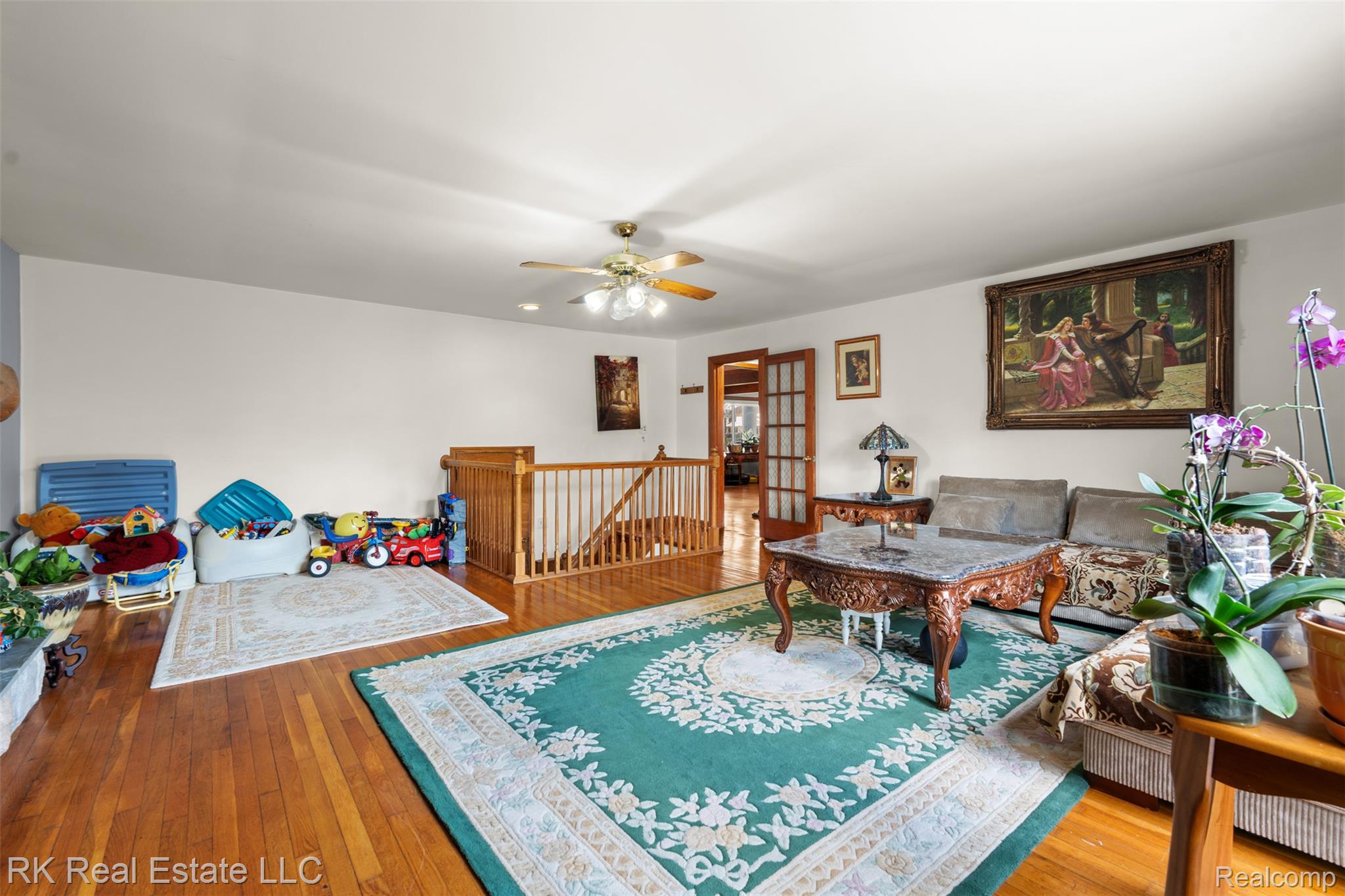13799 31 Mile Road Washington, MI 48095 - Photo 16 of 40 Living room with hardwood / wood-style floors and ceiling fan