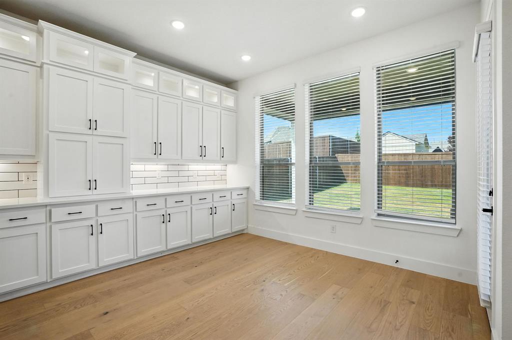 4621 Mount Vista Road Oak Point, TX 75068 - Photo 15 of 40 a large kitchen with a large window