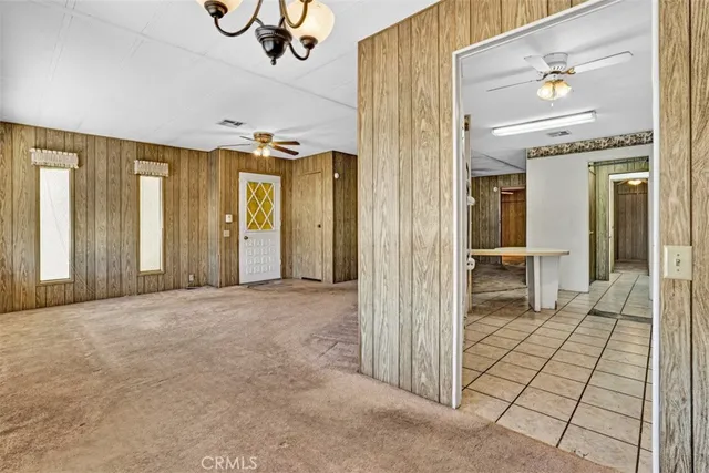 wooden floor with a bedroom and windows