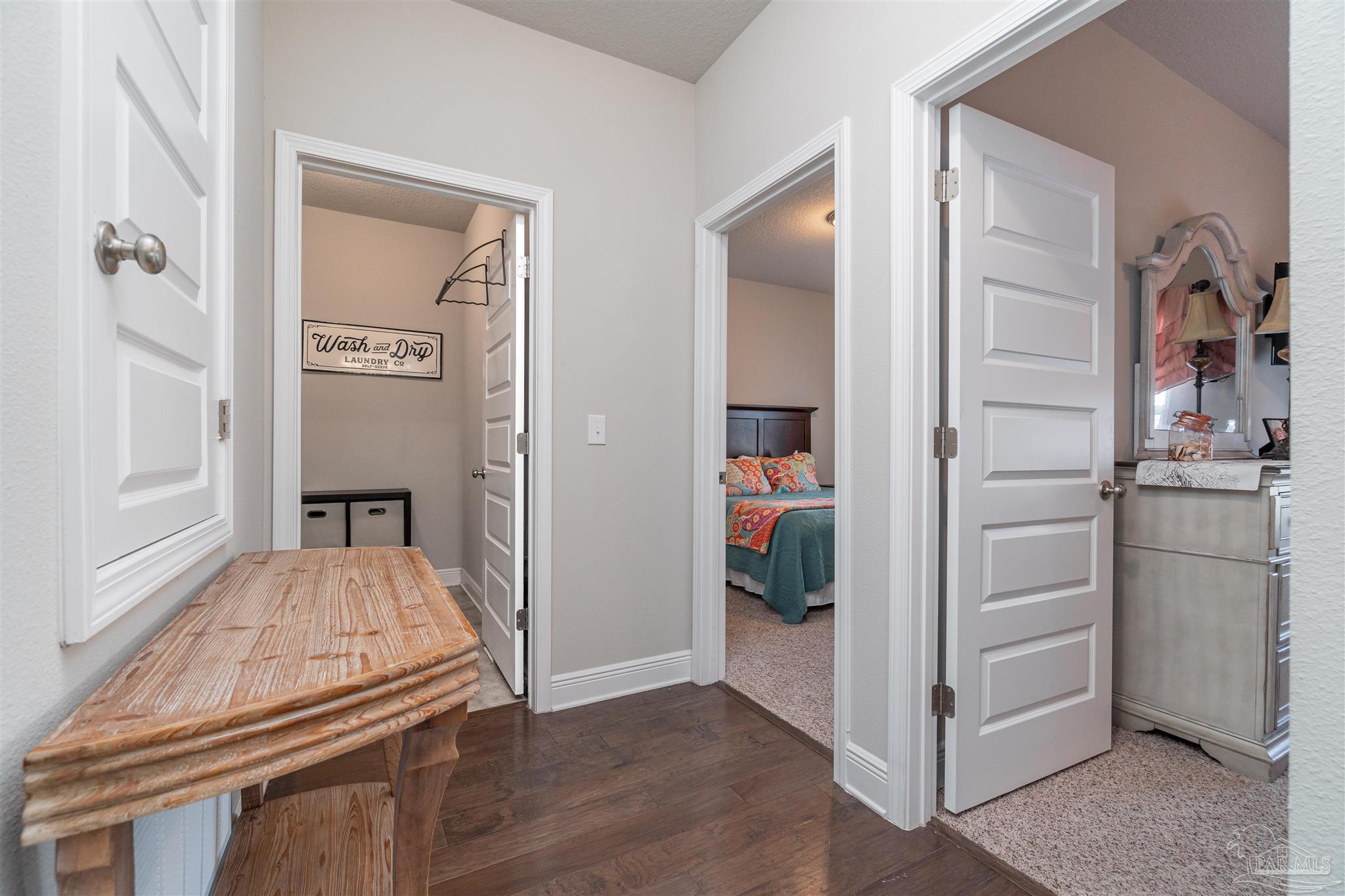 7997 Woodbrook Road Pensacola, FL 32526 - Photo 4 of 35 a view of kitchen with furniture and wooden floor