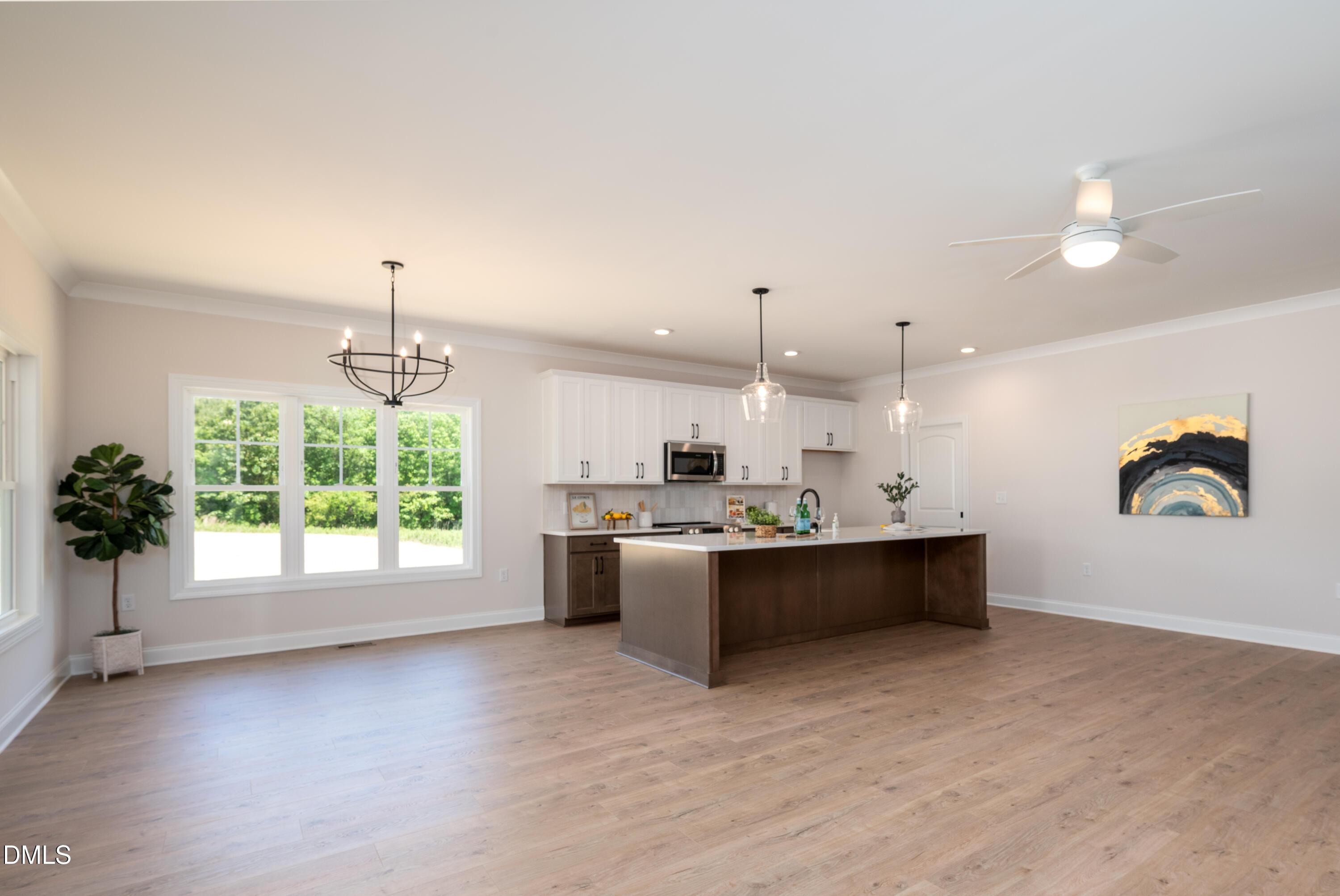 2275 Peachtree Hills Road Spring Hope, NC 27882 - Photo 12 of 43 a large kitchen with kitchen island a large window in it