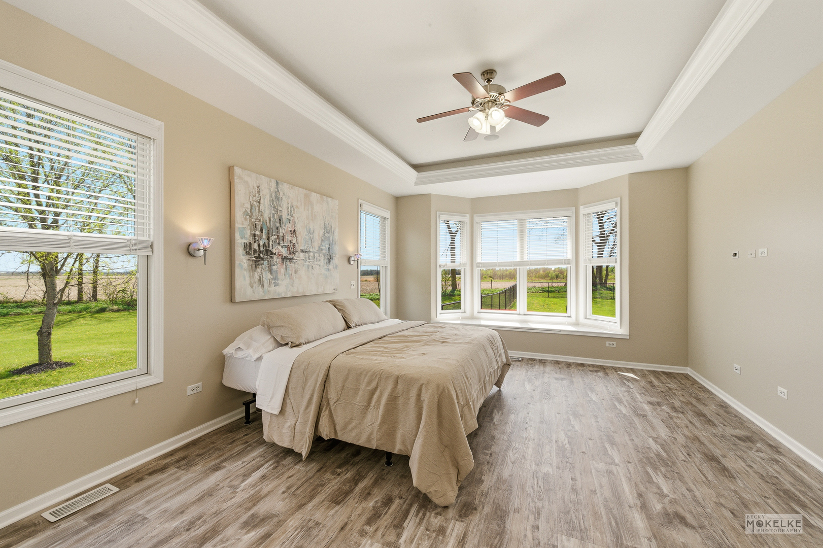 2953 4459th Road Newark, IL 60541 - Photo 17 of 39 a bed sitting in a spacious bedroom next to a window