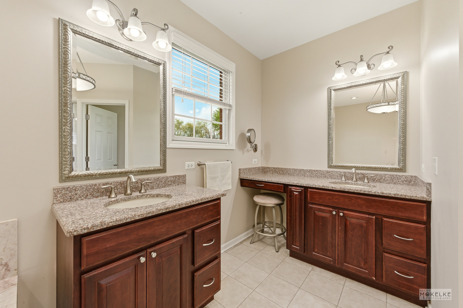 2953 4459th Road Newark, IL 60541 - Photo 22 of 39 a bathroom with a granite countertop sink a light fixture and a mirror