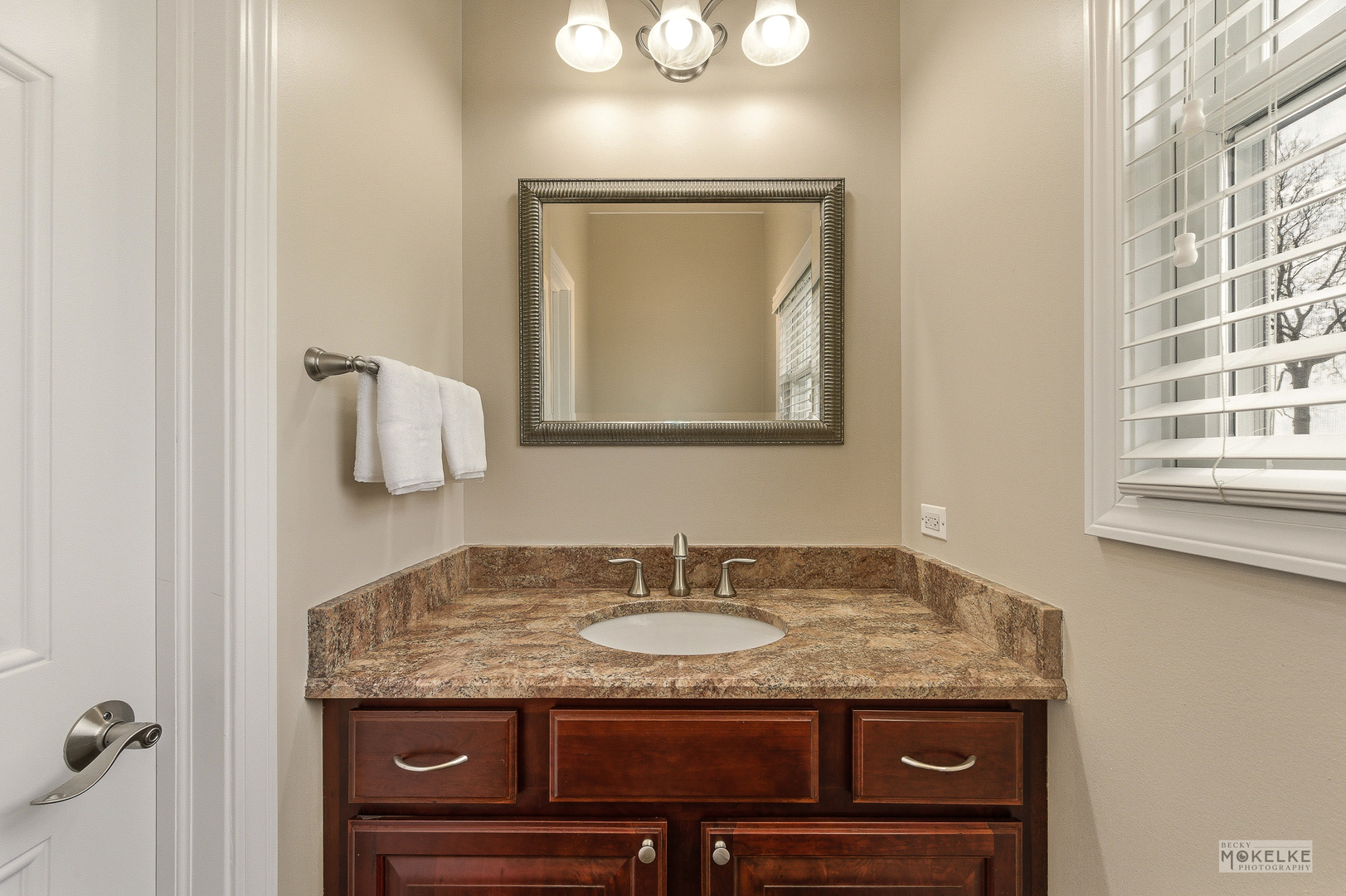 2953 4459th Road Newark, IL 60541 - Photo 23 of 39 a bathroom with a granite countertop sink and a mirror
