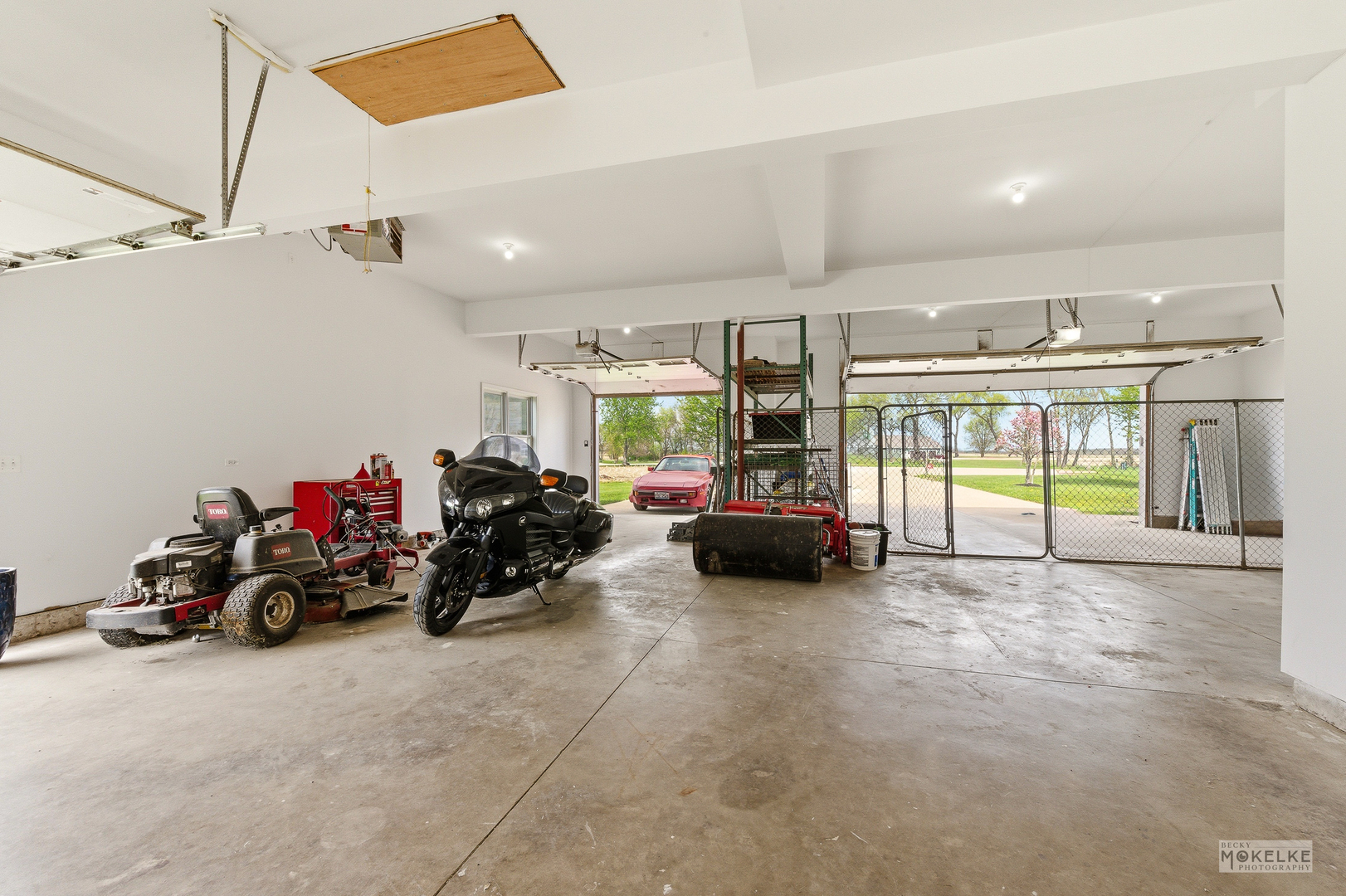 2953 4459th Road Newark, IL 60541 - Photo 34 of 39 a view of a garage with parked cars