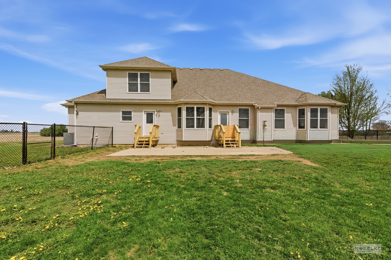 2953 4459th Road Newark, IL 60541 - Photo 5 of 39 a front view of a house with a yard