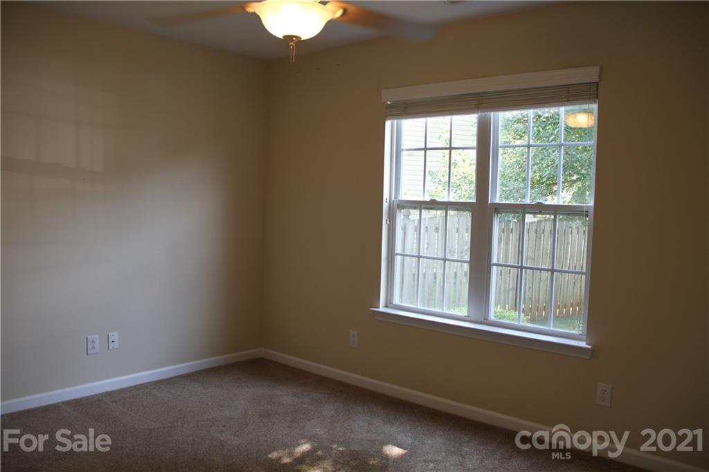11233 Dickie Ross Road Charlotte, NC 28277 - Photo 15 of 26 an empty room with a window