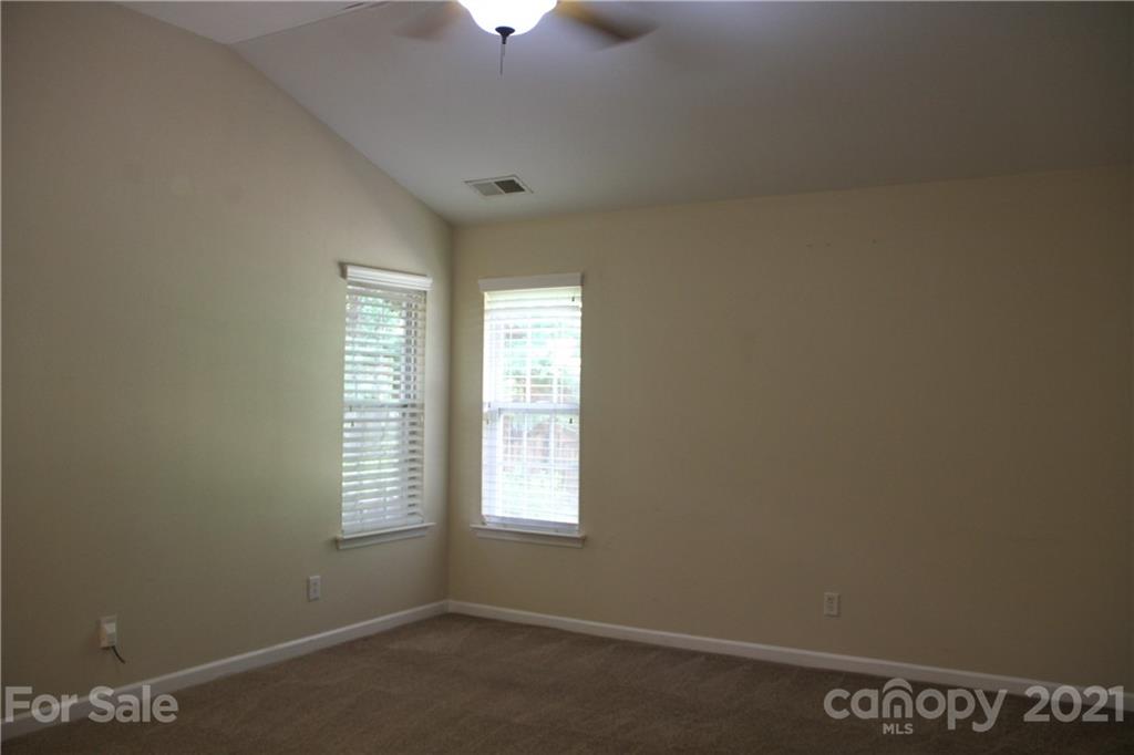 11233 Dickie Ross Road Charlotte, NC 28277 - Photo 19 of 26 an empty room with a window
