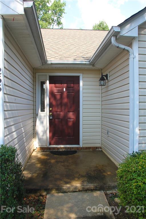 11233 Dickie Ross Road Charlotte, NC 28277 - Photo 3 of 26 a view of a door of the house