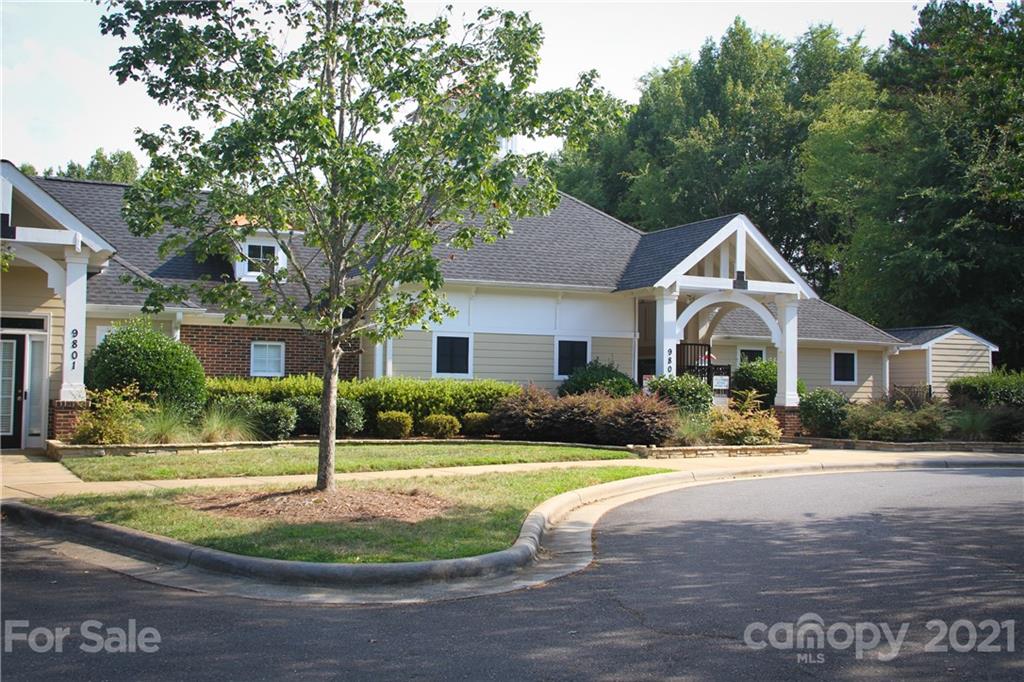11233 Dickie Ross Road Charlotte, NC 28277 - Photo 24 of 26 a front view of a house with a yard and green space