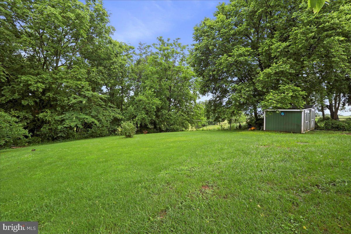 1956 Cattail Run Road Charles Town, WV 25414 - Photo 27 of 29 a view of a backyard with a garden