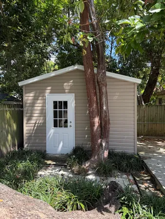 a house view with a garden space
